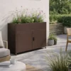 Armoire de jardin en métal Tessa 100cm marron jardinière intégrée avec plantes et fleurs