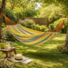 Hamac 1 place en coton rayé multicolore Cali suspendu dans jardin, toile hamac extérieur détente